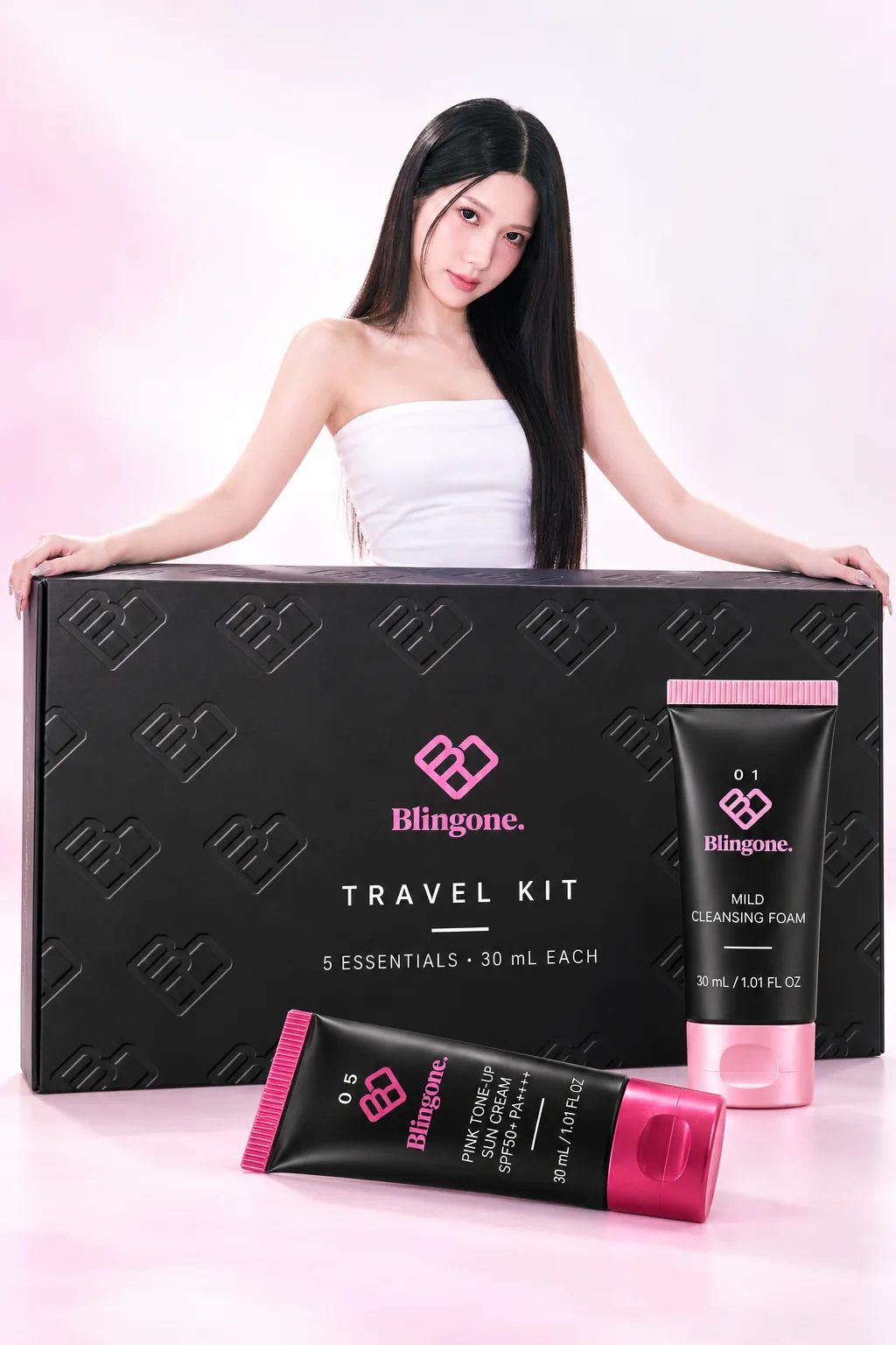 Blingone member behind the giant travel kit box